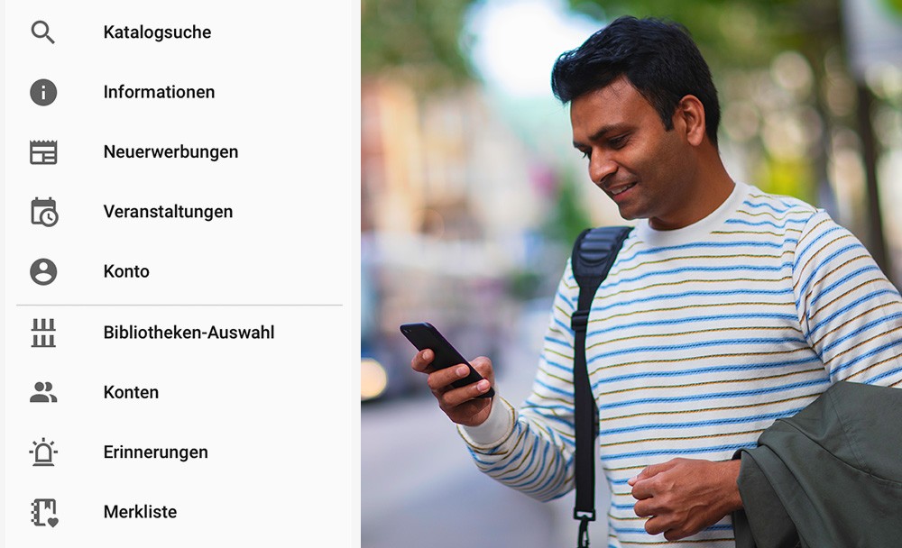 Abbildung: Mann schaut auf die YourBib-Funktionsübersicht