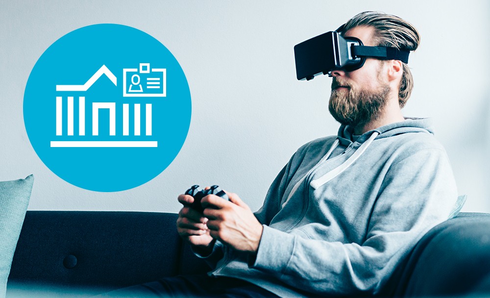 Man using virtual reality goggles borrowed from library