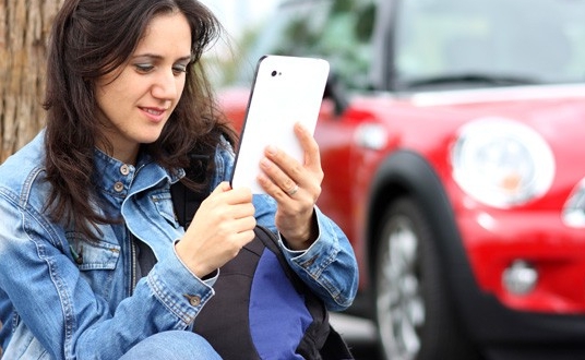 Woman looking at tablet computer