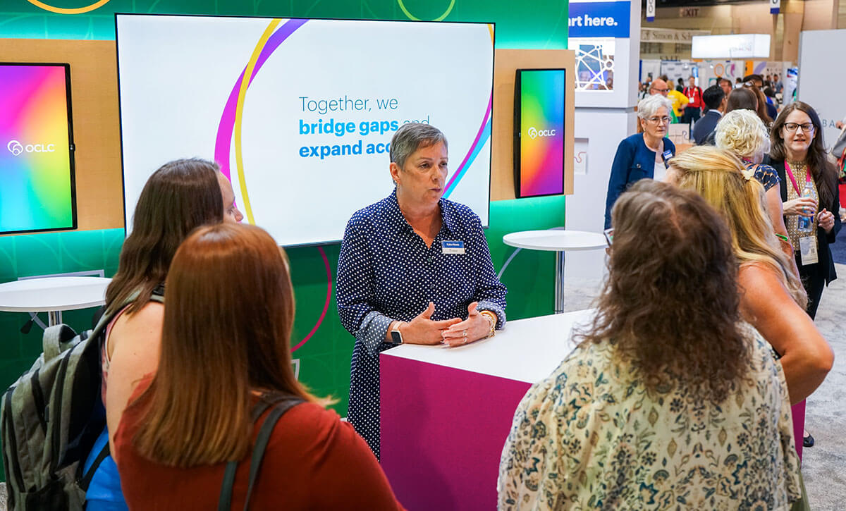 Photo: Discussion at OCLC ALA Annual booth