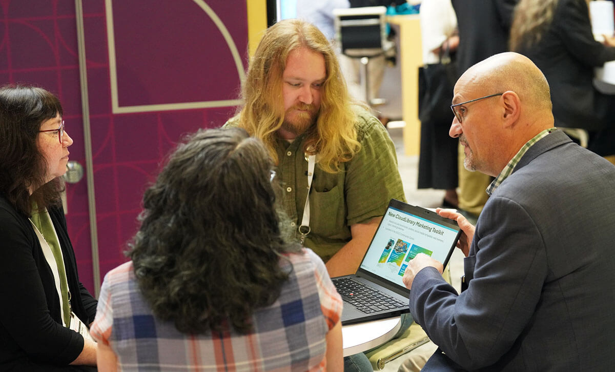 Photo: Discussion at OCLC ALA Annual booth