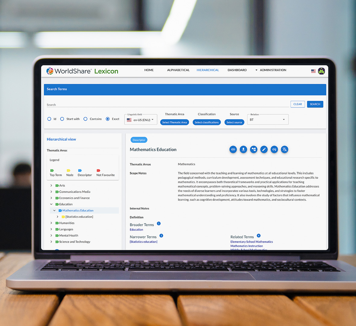 Photo: WorldShare Lexicon on a laptop in a library workspace